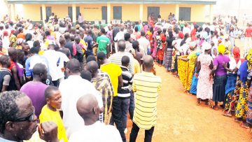 8cf7a01c-voters-queuing-to-cast-their-vores-during-an-election